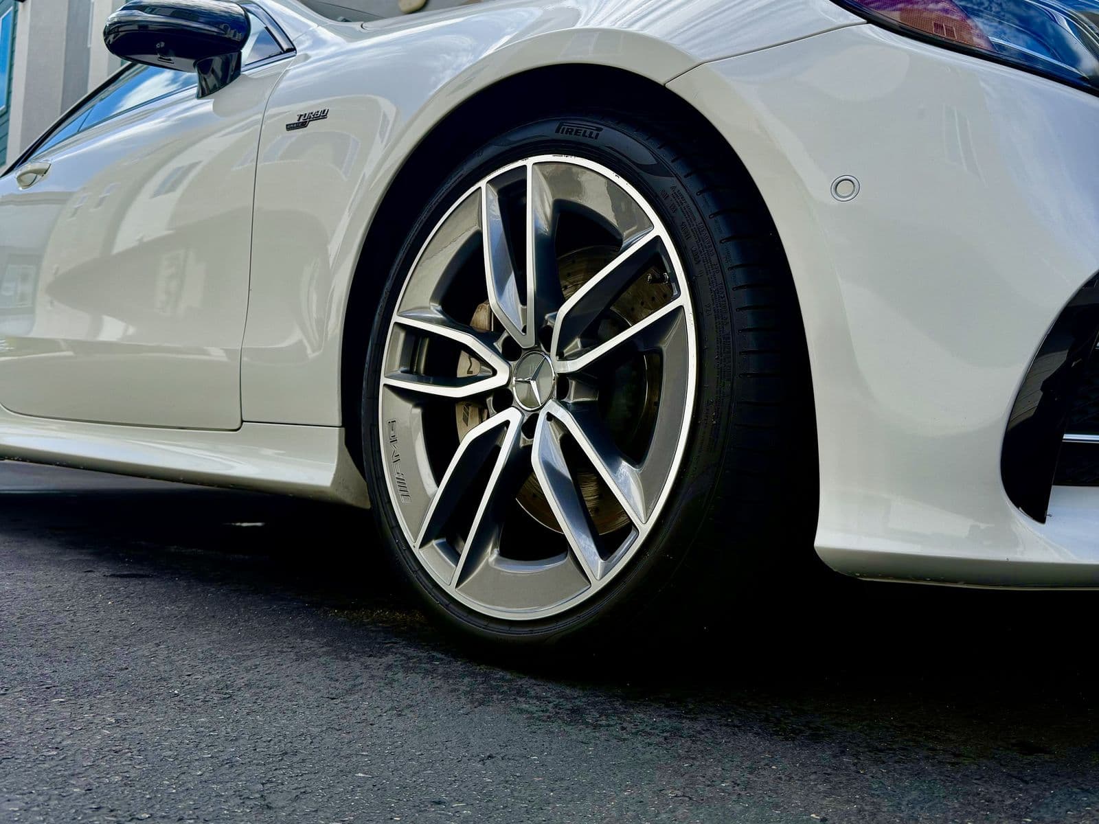Close-up detail work on a Mercedes-AMG